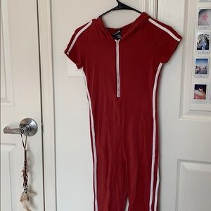 Stretchy romper with hood